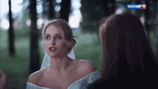 a woman in a wedding dress is talking to another woman on a tv screen that says pocen