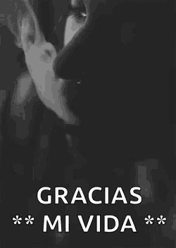 a black and white photo of a woman 's face with the words gracias mi vida