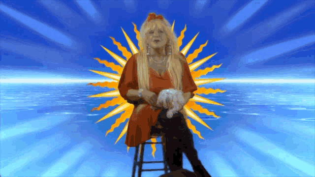 a woman in a red dress is sitting on a stool