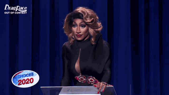 a drag queen is giving a speech at the drag race out of context awards