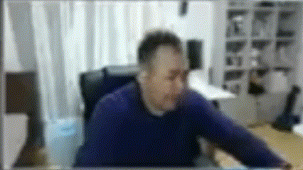 a blurry picture of a man wearing headphones