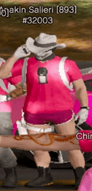 a man wearing a cowboy hat and a pink shirt with the number 3 2003