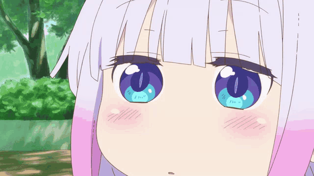 a close up of a cartoon character 's face with blue eyes