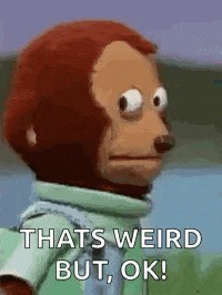 a stuffed monkey is making a funny face and saying `` that 's weird but ok ! ''
