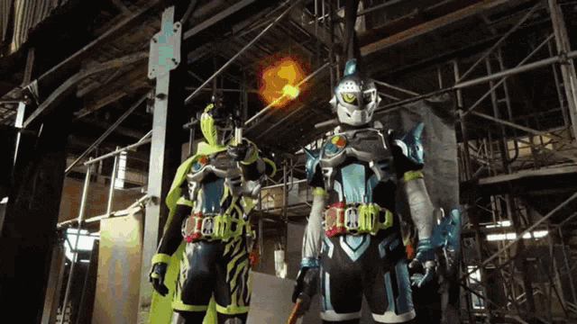two kamen riders are standing next to each other in a warehouse