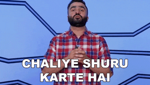 a man in a plaid shirt stands in front of a blue background and says chaliye shuru karte hai