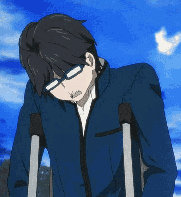 a man wearing glasses and crutches with a blue sky behind him