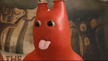 a cartoon character is standing in front of a red sign that says the