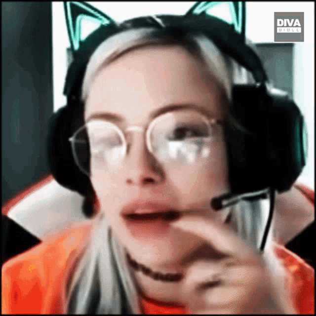 a woman wearing glasses and headphones with a diva logo on the bottom