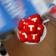 a bunch of red squares with white letters t on them