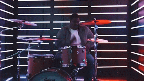 Drumming Adrian Brown GIF - Drumming Adrian Brown Action Adventure GIFs