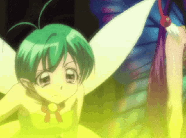 a little girl with green hair and white wings is wearing a yellow top
