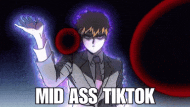 a man in a suit and tie with the words mid ass tiktok