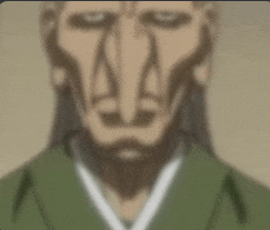 a blurry picture of a man with a very long nose