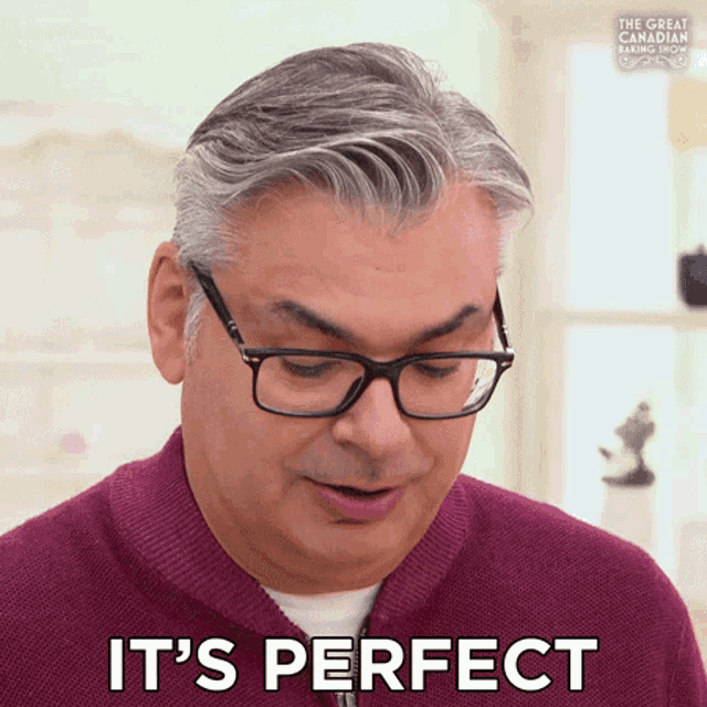 a man wearing glasses says it 's perfect in a purple shirt