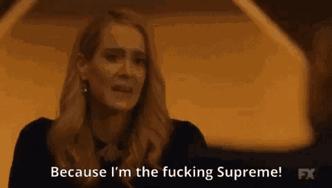 a woman is talking to a man and says `` because i 'm the fucking supreme ! ''