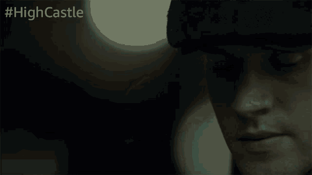 a close up of a man 's face with the hashtag #highcastle