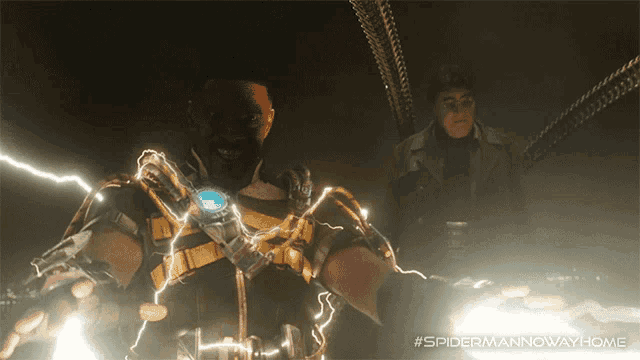 a poster for spider man now way home shows a man with lightning coming out of his hands