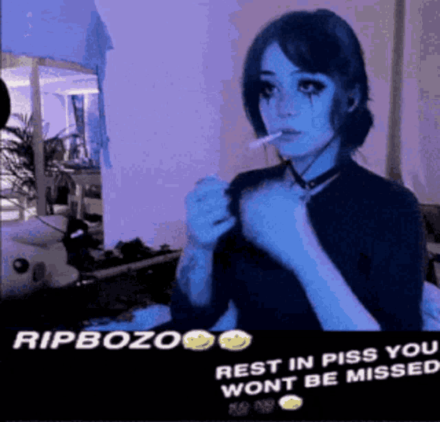 a picture of a girl smoking a cigarette with the caption rip bozo rest in piss you wont be missed