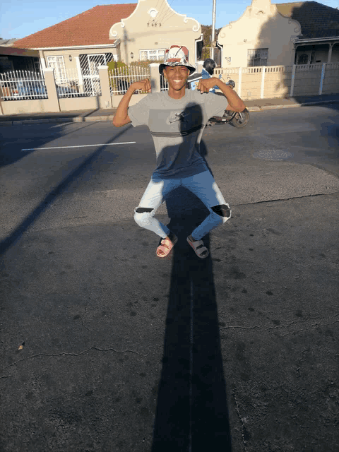 a person wearing a nike shirt is kneeling down