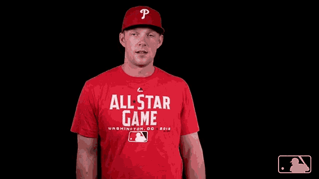a man wearing an all star game shirt