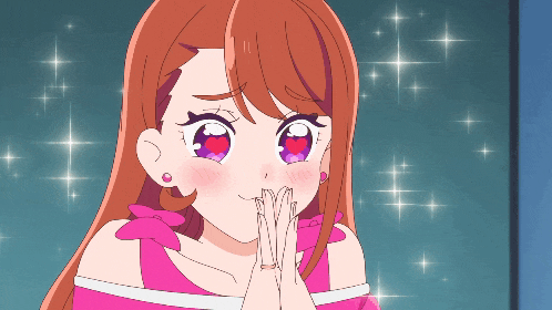 a girl with a heart in her eyes is wearing a pink dress
