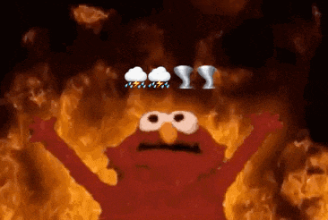 elmo from sesame street is surrounded by flames and clouds