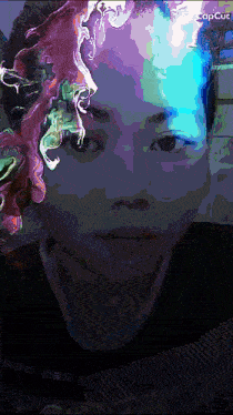 a colorful painting of a person 's face with the word copcut in the corner