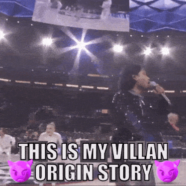 a man singing into a microphone with the words " this is my villan origin story " below him
