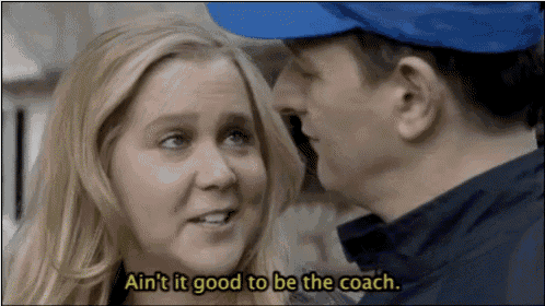 a man and a woman are talking and the woman says ain t it good to be the coach