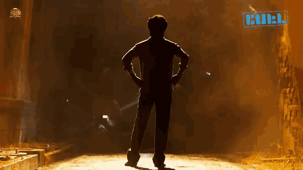 a silhouette of a man standing in front of a sign that says ' cinel ' on it