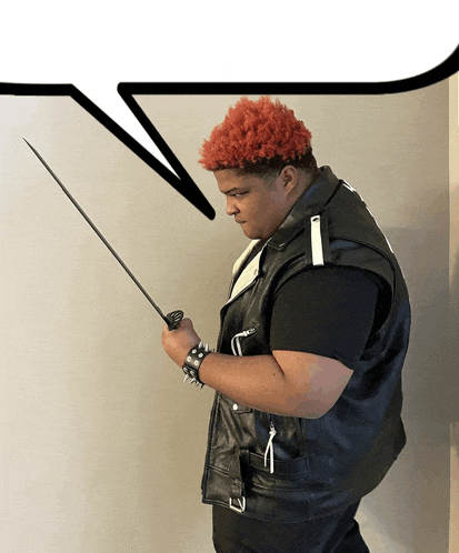 a man with red hair is holding a sword in his right hand
