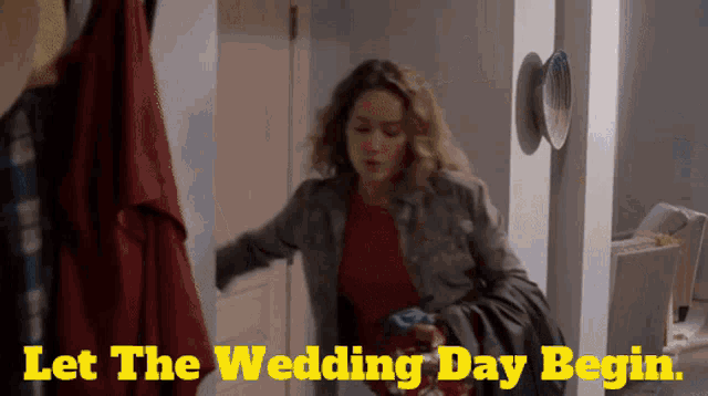 a woman is standing in a hallway with the words let the wedding day begin on the bottom