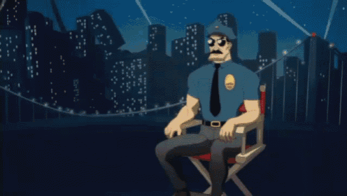 a cartoon police officer is sitting in a director 's chair