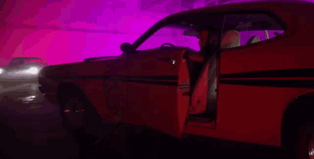 a yellow car with the door open and a purple background