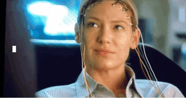 a woman with wires coming out of her head