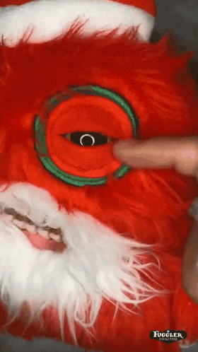 a close up of a stuffed animal that says fugler on the bottom