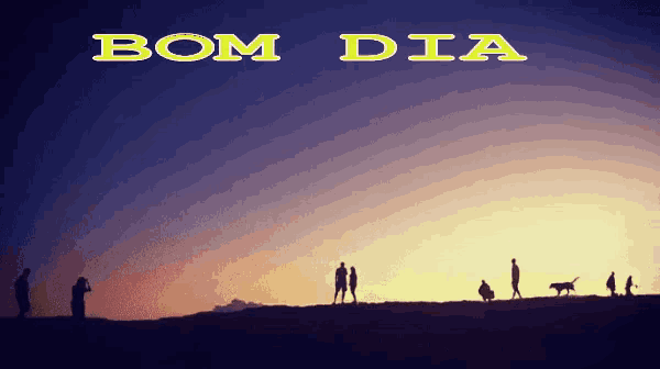 a group of people standing on top of a hill with bom dia written on the bottom