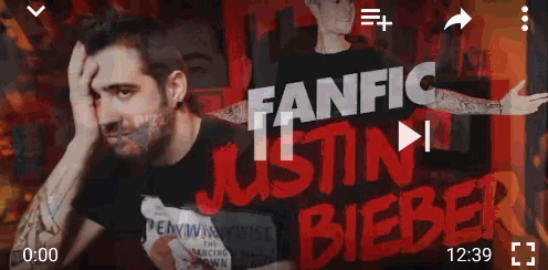 a video of a man with a shirt that says ten pennywise on it