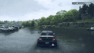 a car is parked in a parking lot with a sign that says " race down "