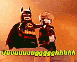 a lego batman and robin are standing next to each other and talking .