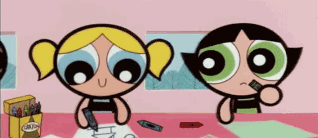 bubbles and buttercup from the powerpuff girls are sitting at a table with crayons