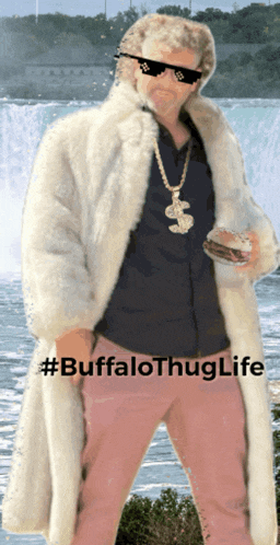 a man wearing sunglasses and a fur coat is standing in front of a waterfall with the hashtag #buffalothuglife