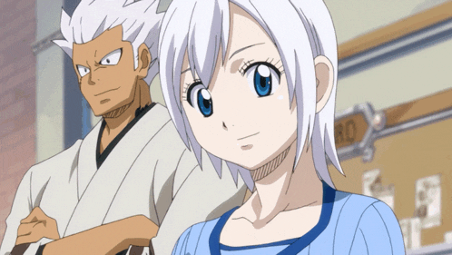 a man and a girl are standing in front of a sign that says no