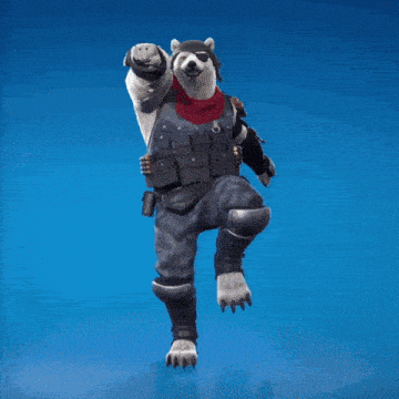 a husky wearing a bandana and a hat is standing on one leg