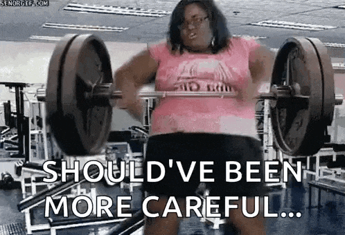 a fat woman is squatting with a barbell in a gym and says `` should 've been more careful '' .