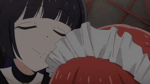 a girl with black hair and a red dress is smiling