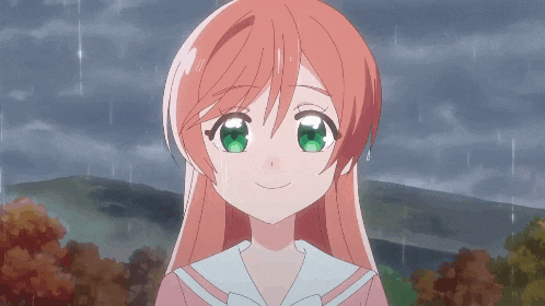 a girl with red hair and green eyes is smiling in the rain