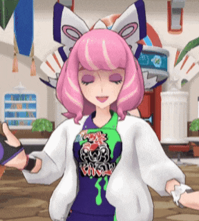 a girl with pink hair is wearing a shirt that says pokemon