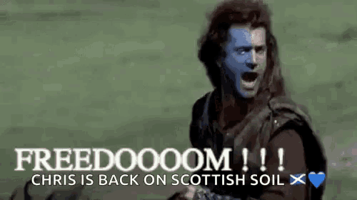 a man with blue paint on his face is screaming with the words chris is back on scottish soil .